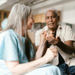 elderly woman lighting up a joint